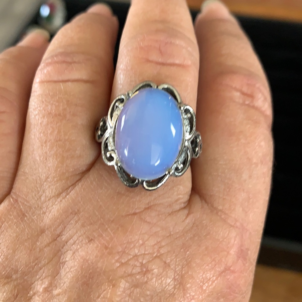 Ring with a blue stone